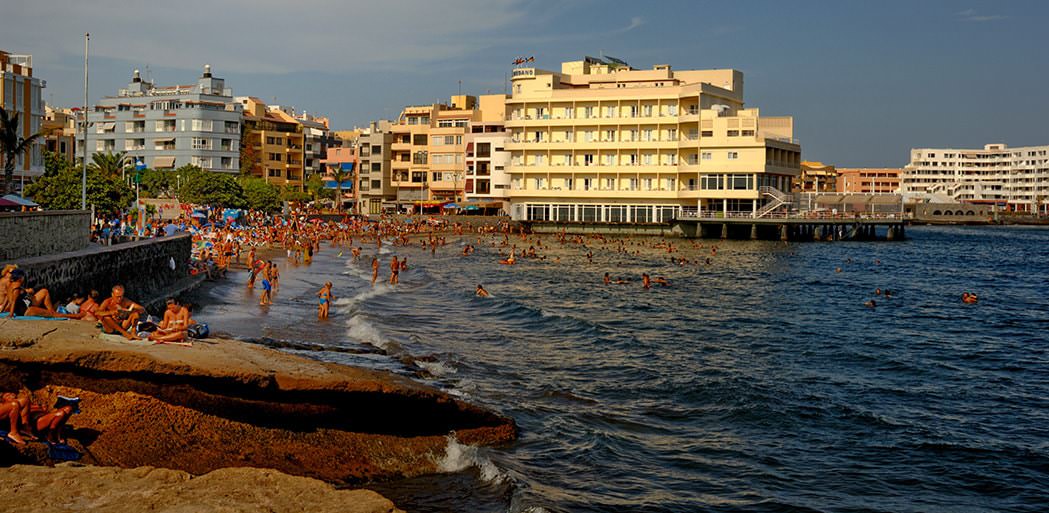 In the summer months El Medano beach can get pretty packed with sunbathers and swimmers, Tenerife.