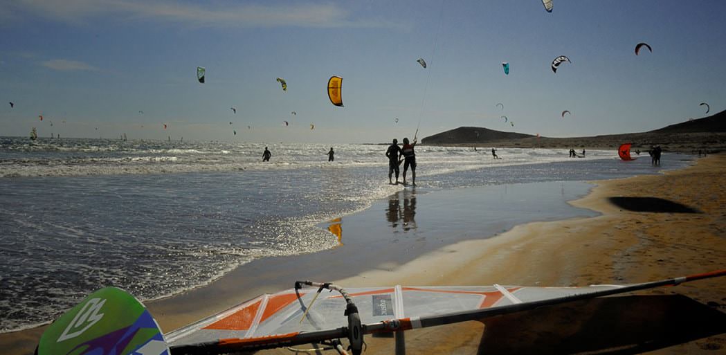 kite surfers and surfers on medano beach close to the red rock.